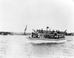 Old photo of a Water Taxi boat going across Lake Minnetonka